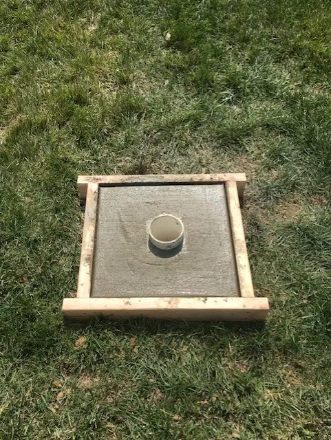 Concrete foundation with ground sleeve for flagpole